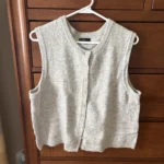 Featured thumbnail for Grey sleeveless jacket