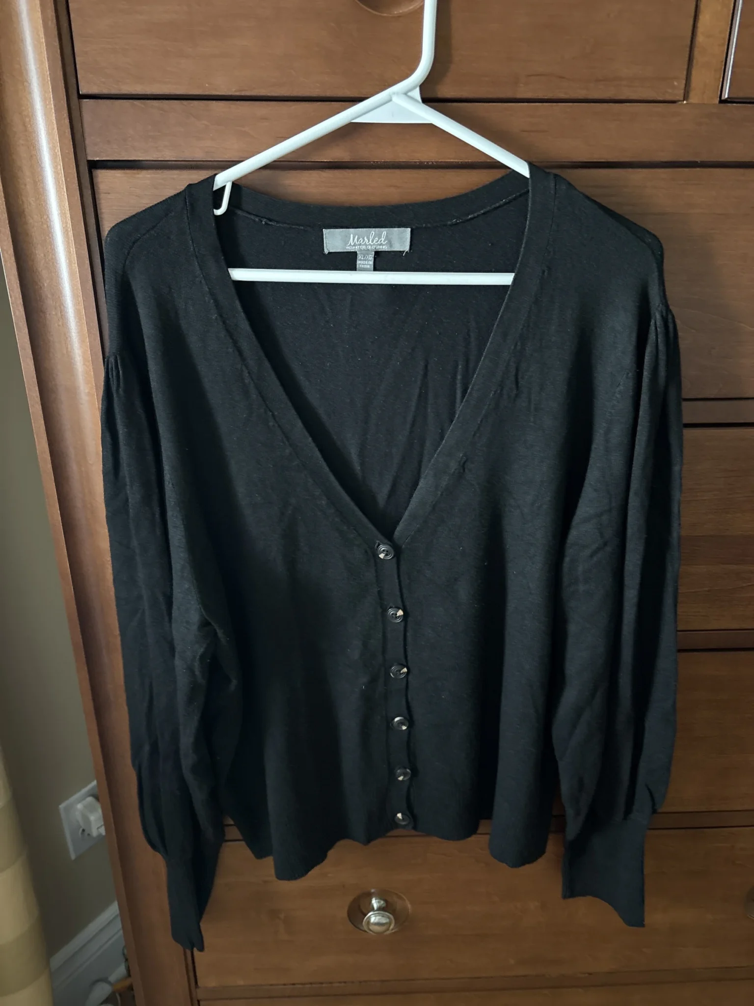 Featured image for Low-necked top with puffed sleeves