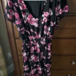 Featured thumbnail for Black dress with pink flowers