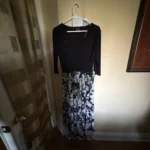 Featured thumbnail for Long black dress with a floral pattern