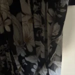 Thumbnail for Long black dress with a floral pattern
