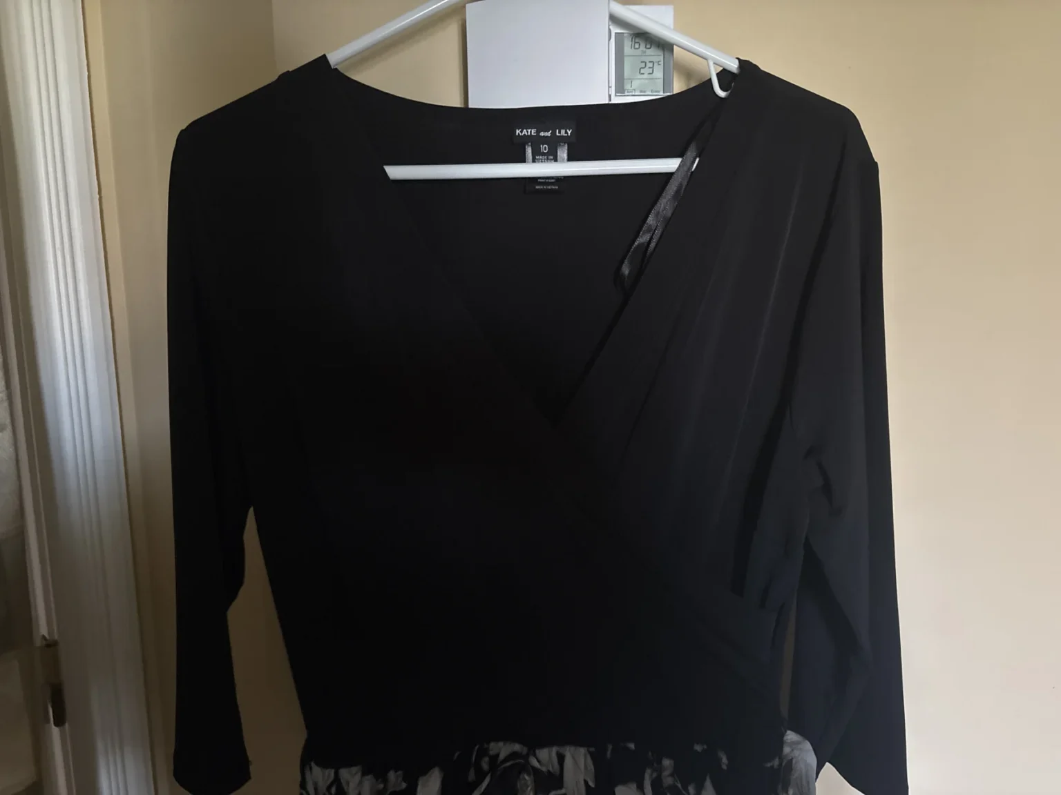 Image for Long black dress with a floral pattern