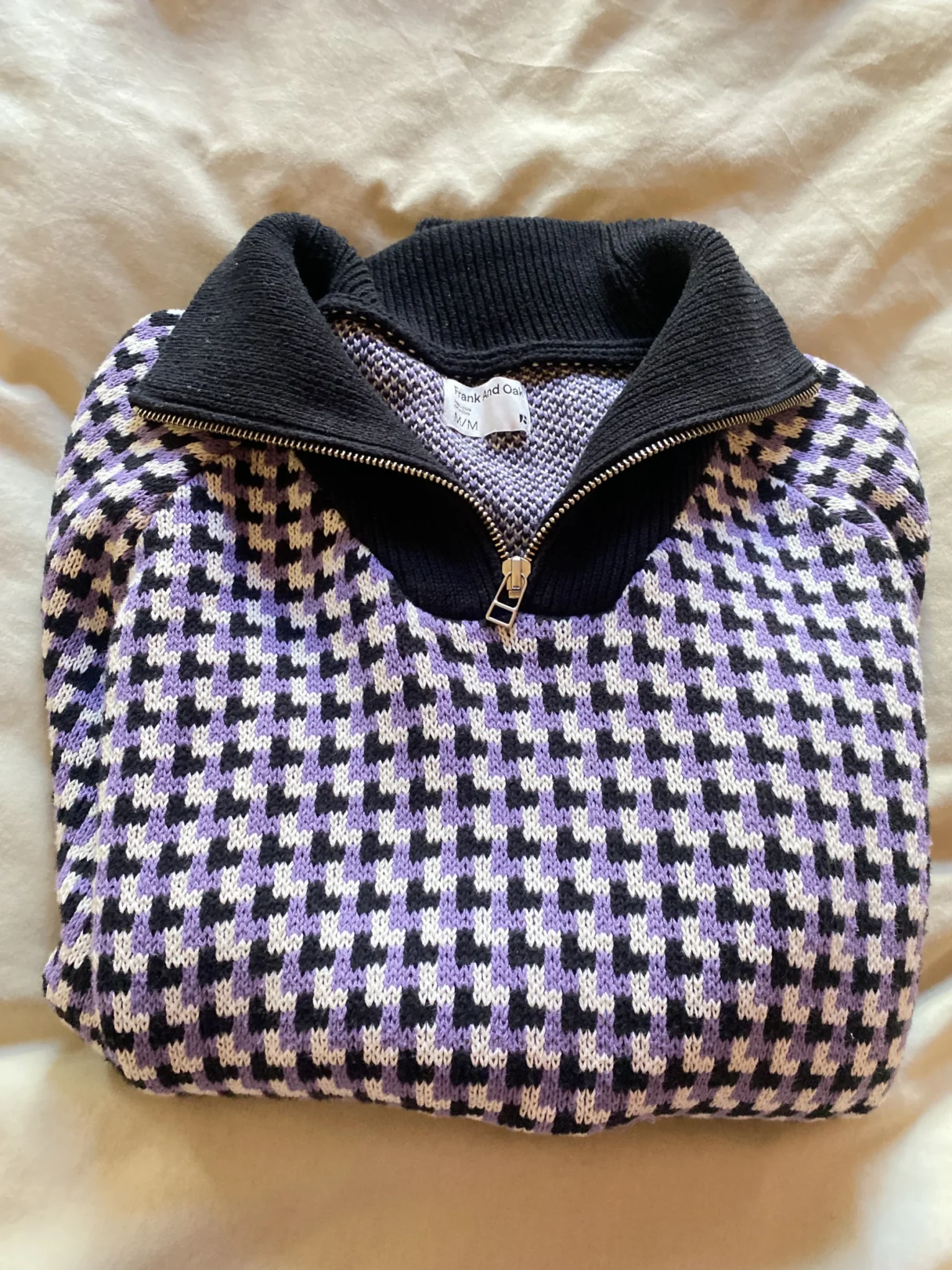 Featured image for Mauve, black and white jumper