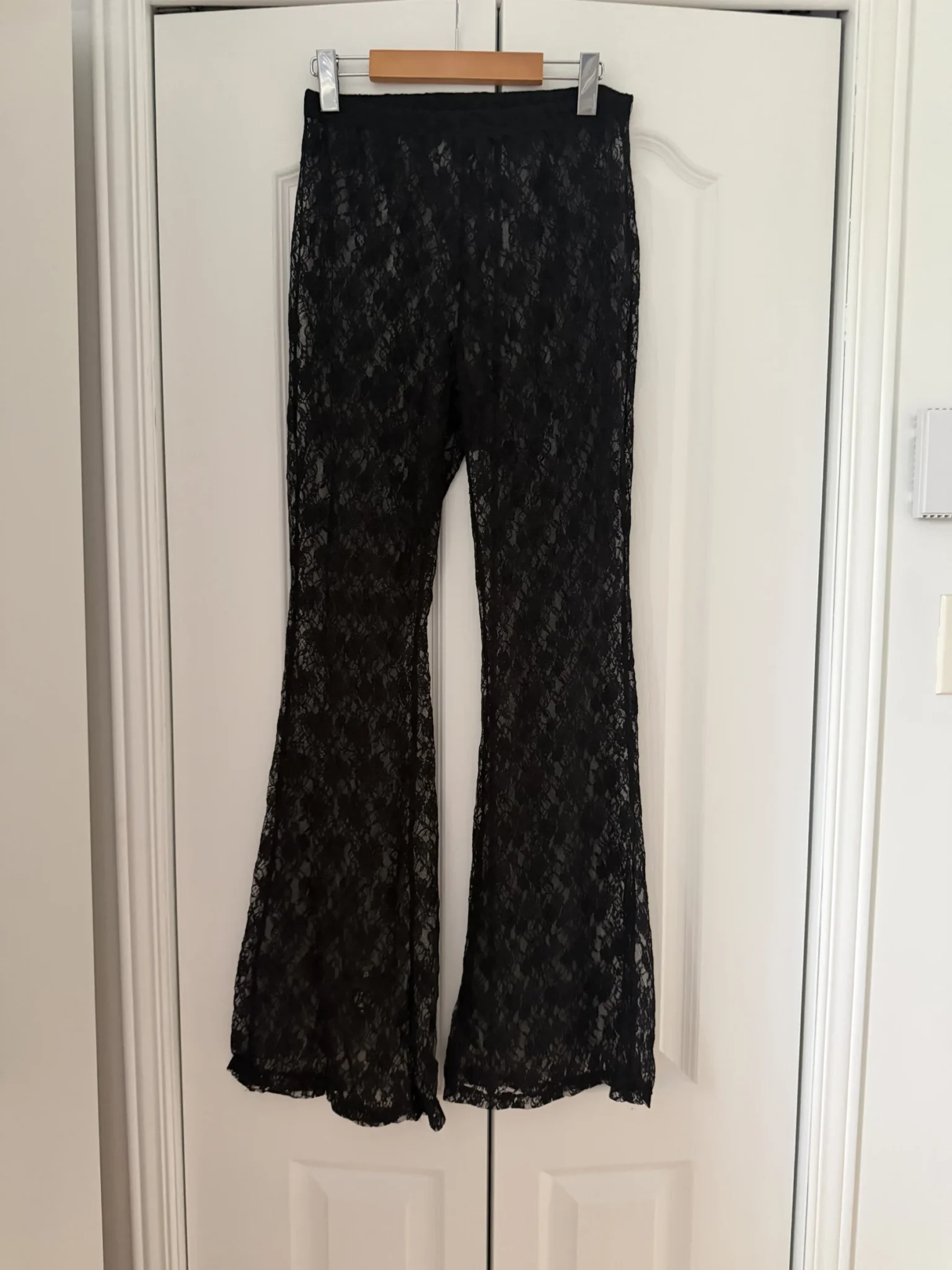 Image for Medium-length sheer lace trousers