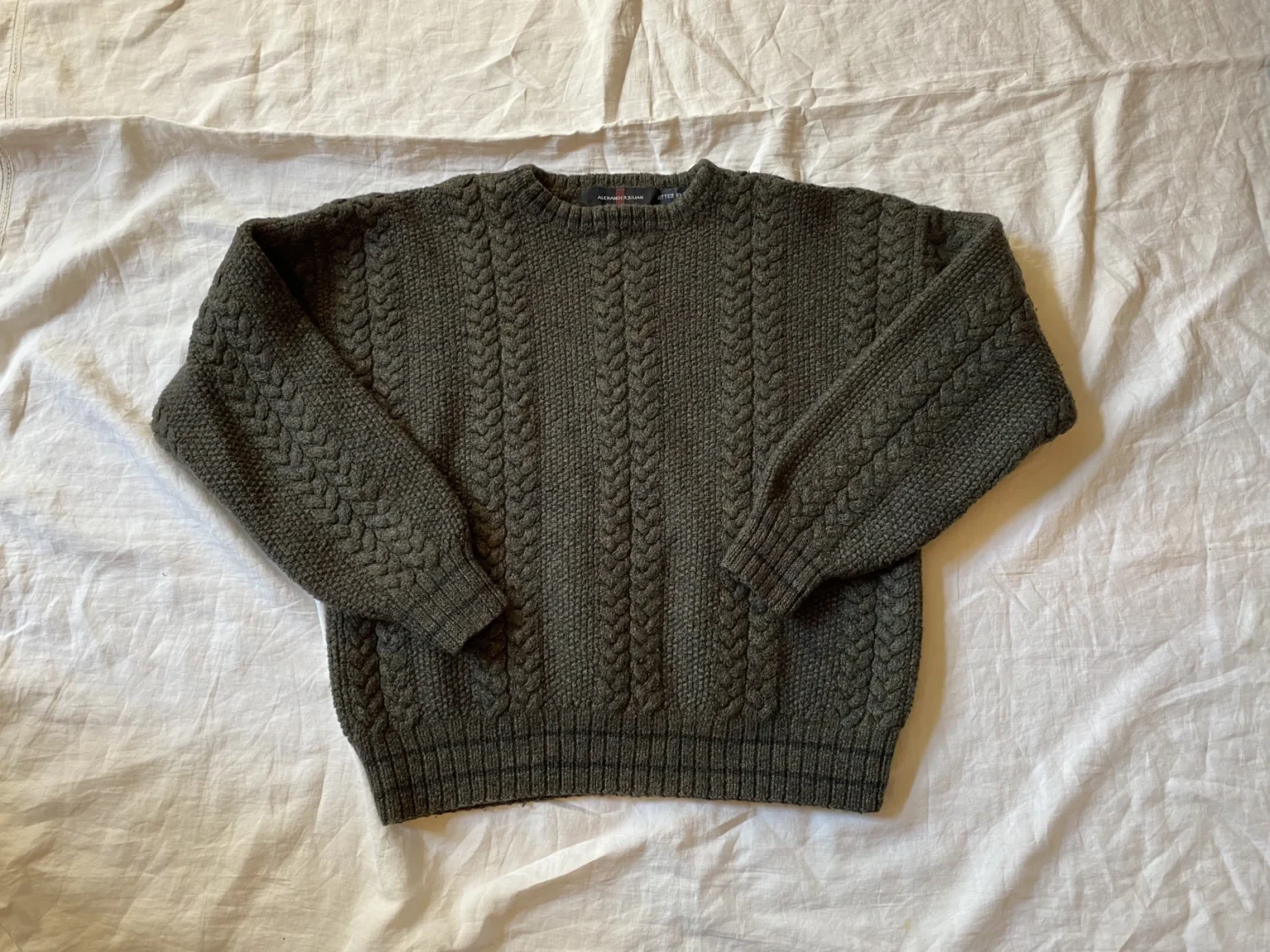 Featured image for Green woollen jumper