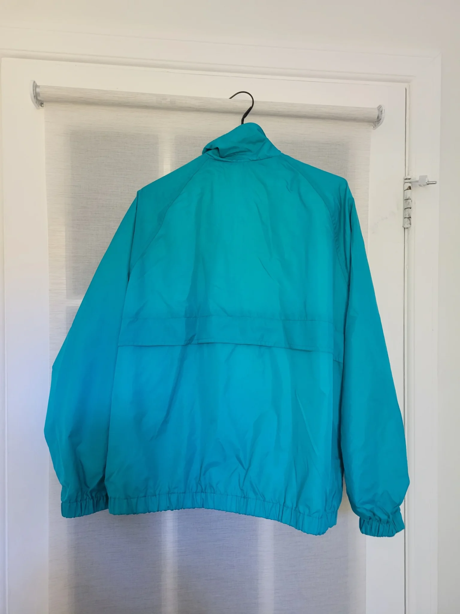 Image for Turquoise blue waterproof jacket