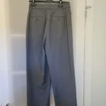Thumbnail for Loose-fitting trousers with a pleat