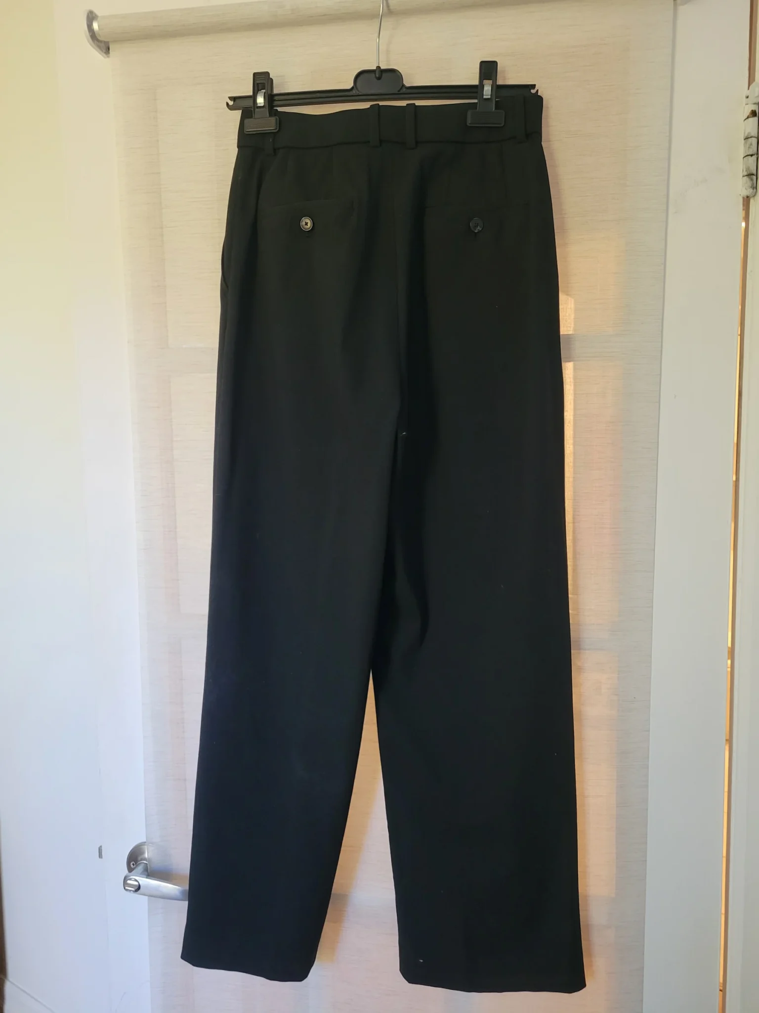 Image for Loose-fitting pleated trousers