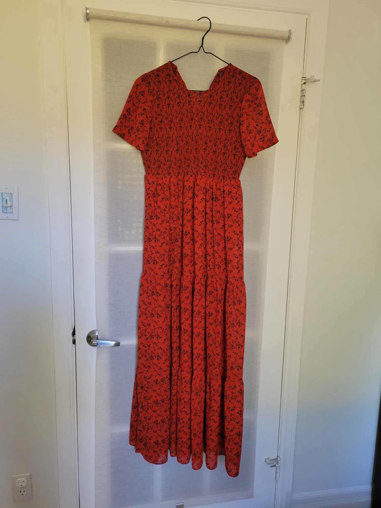Featured image for Long dress with a black floral print