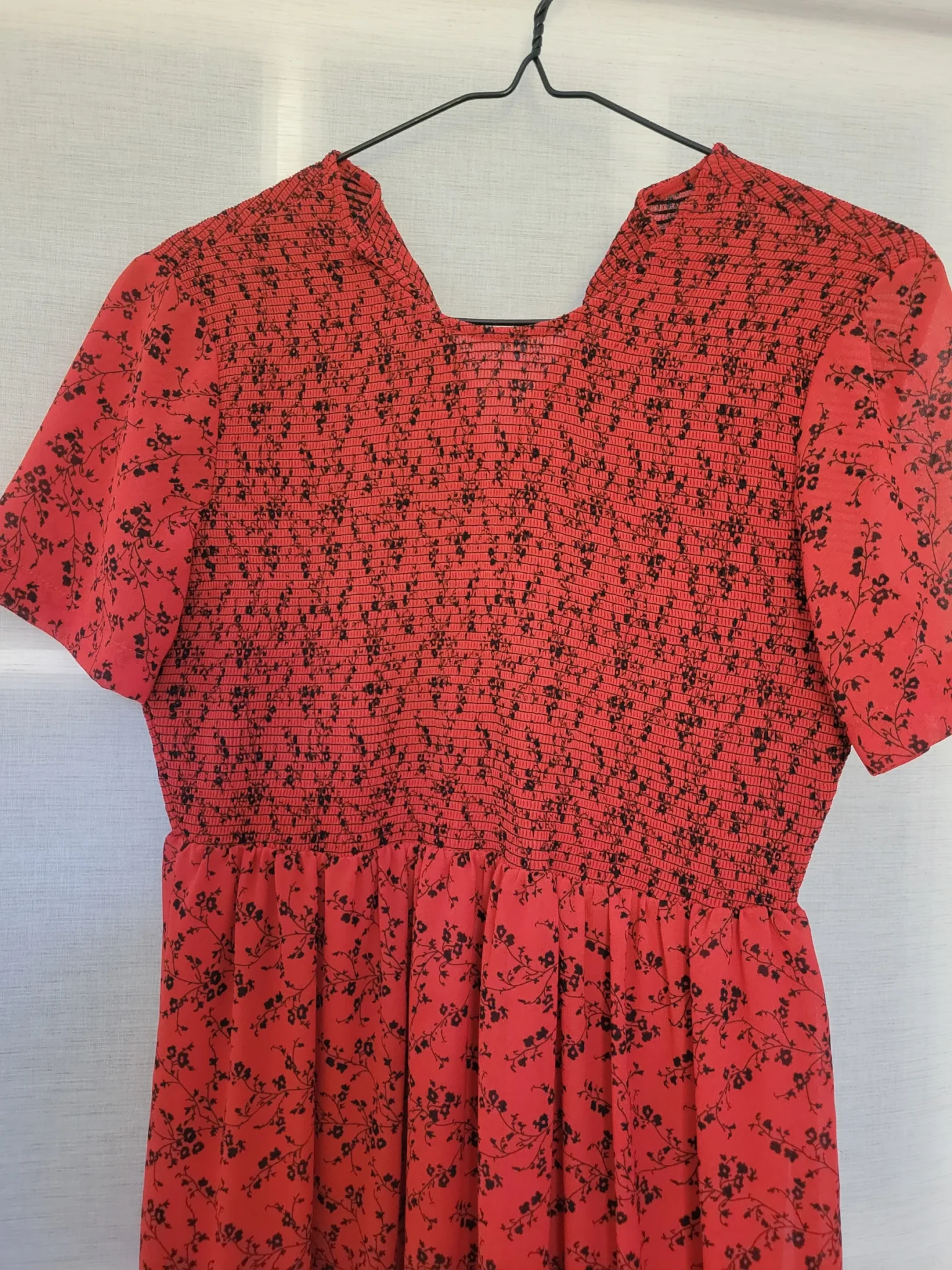 Image for Long dress with a black floral print