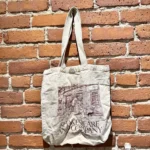 Featured thumbnail for Tote bag beige et rouge Shakespeare and company kilometer zero Paris