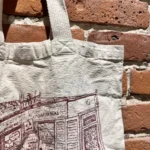 Thumbnail for Tote bag beige et rouge Shakespeare and company kilometer zero Paris