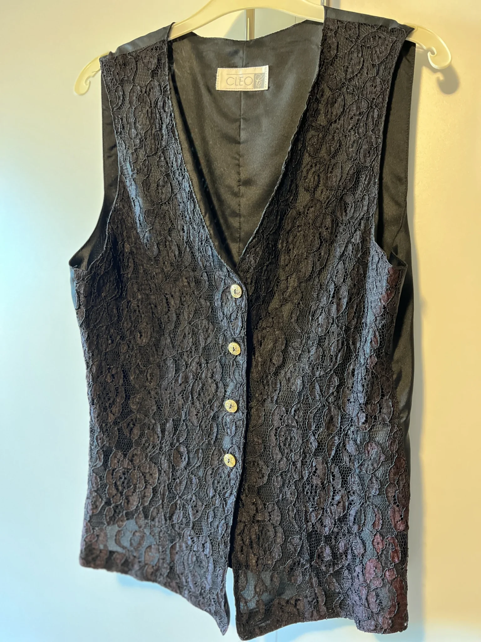 Featured image for Black sleeveless jacket/blouse – Cleo