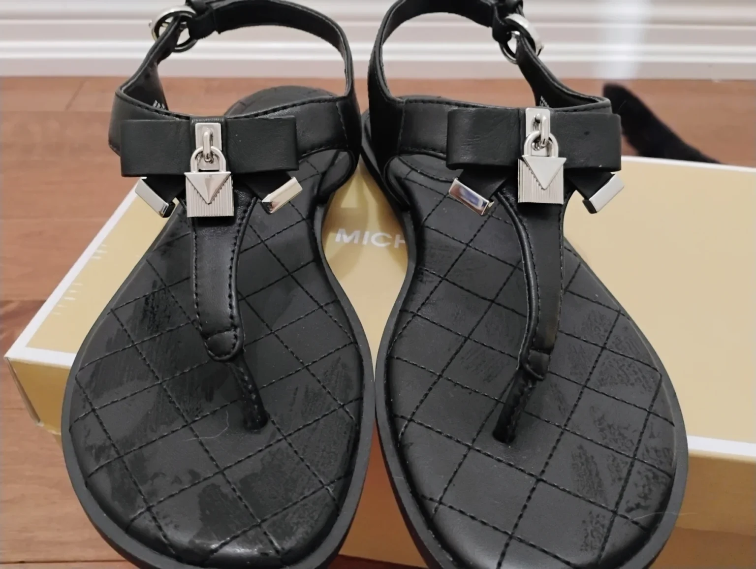 Image for Michael Kors Black Quilted T-Strap Sandals with Silver Hardware