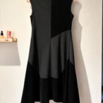 Thumbnail for Black DKNY dress – A mix of textures and an asymmetrical cut – Size 6