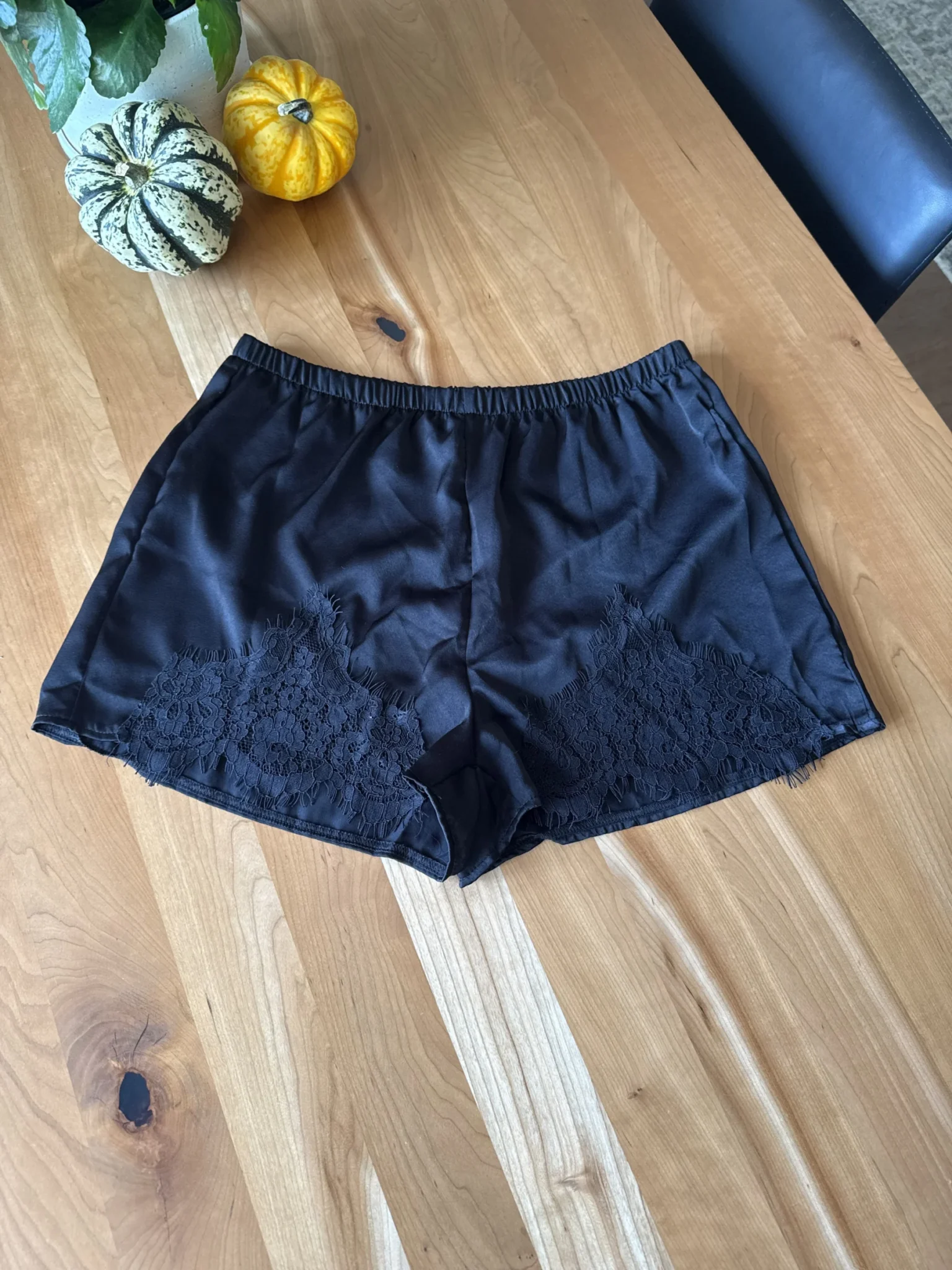 Featured image for Black satin shorts with lace