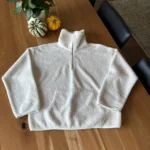Featured thumbnail for Chandail demi-zip en tissu style mouton