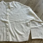 Featured thumbnail for Cream-coloured cardigan