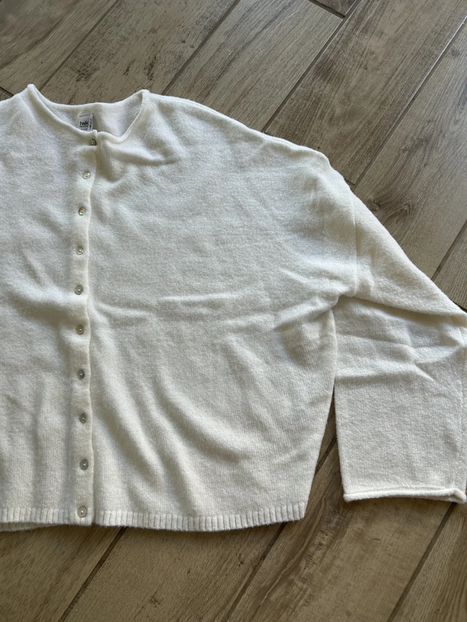 Featured image for Cream-coloured cardigan