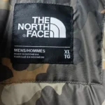 Thumbnail for The North Face hooded winter coat – Black and dark grey, camouflage lining, integrated balaclava.