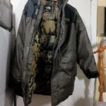 Thumbnail for The North Face hooded winter coat – Black and dark grey, camouflage lining, integrated balaclava.