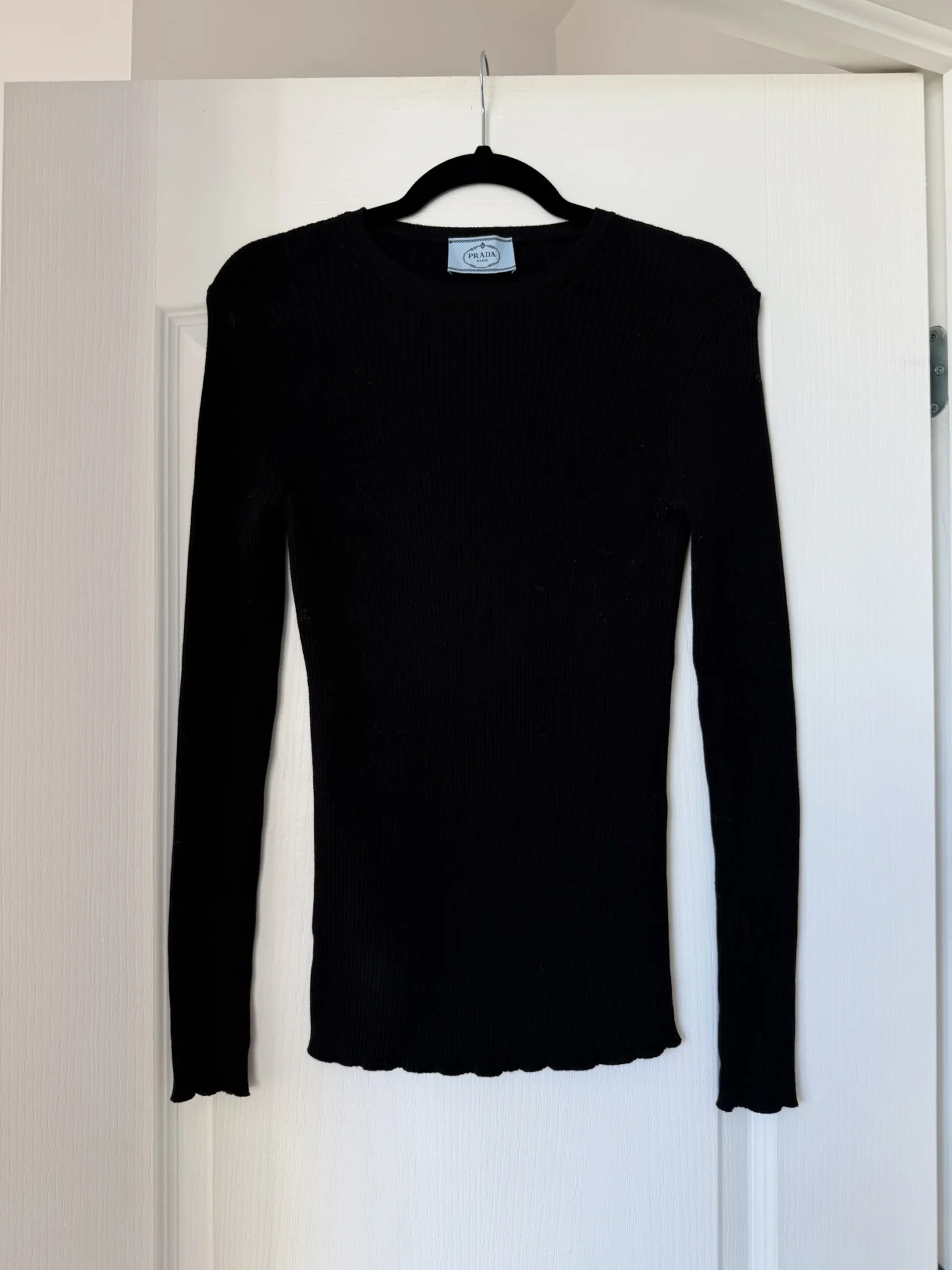 Featured image for Prada black ribbed jumper for women, size 40