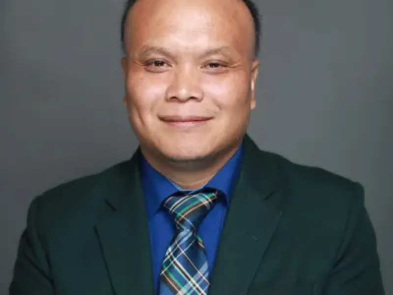 Rev. Dr. William Khen Chum Bik