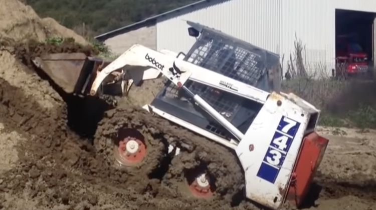 McLaren over-the-tire skid steer tracks