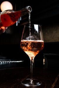 Wine pours in wine glass-My Wine Tasting Journal