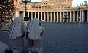38716227 020220005AP Photo Plinio LepriTwo nuns pray in St Peter 27s s