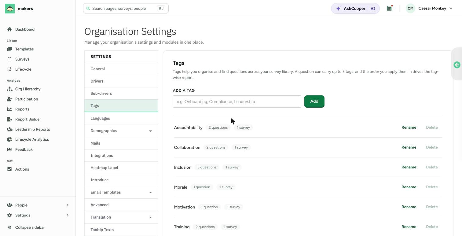 The Tags page in Organisation Settings, with an Add a tag field and a list of tags such as Accountability, Collaboration and Inclusion, each showing its question and survey counts and Rename and Delete actions