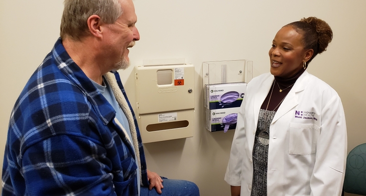 Dr. Mishi Jackson with patient