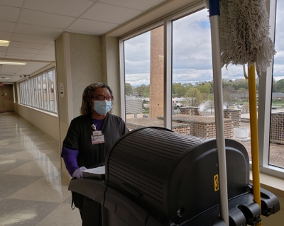 Novant Health Environmental Services team member Esther Reid loves working on a floor where "I get to help celebrate new life entering the world." Esther Reid