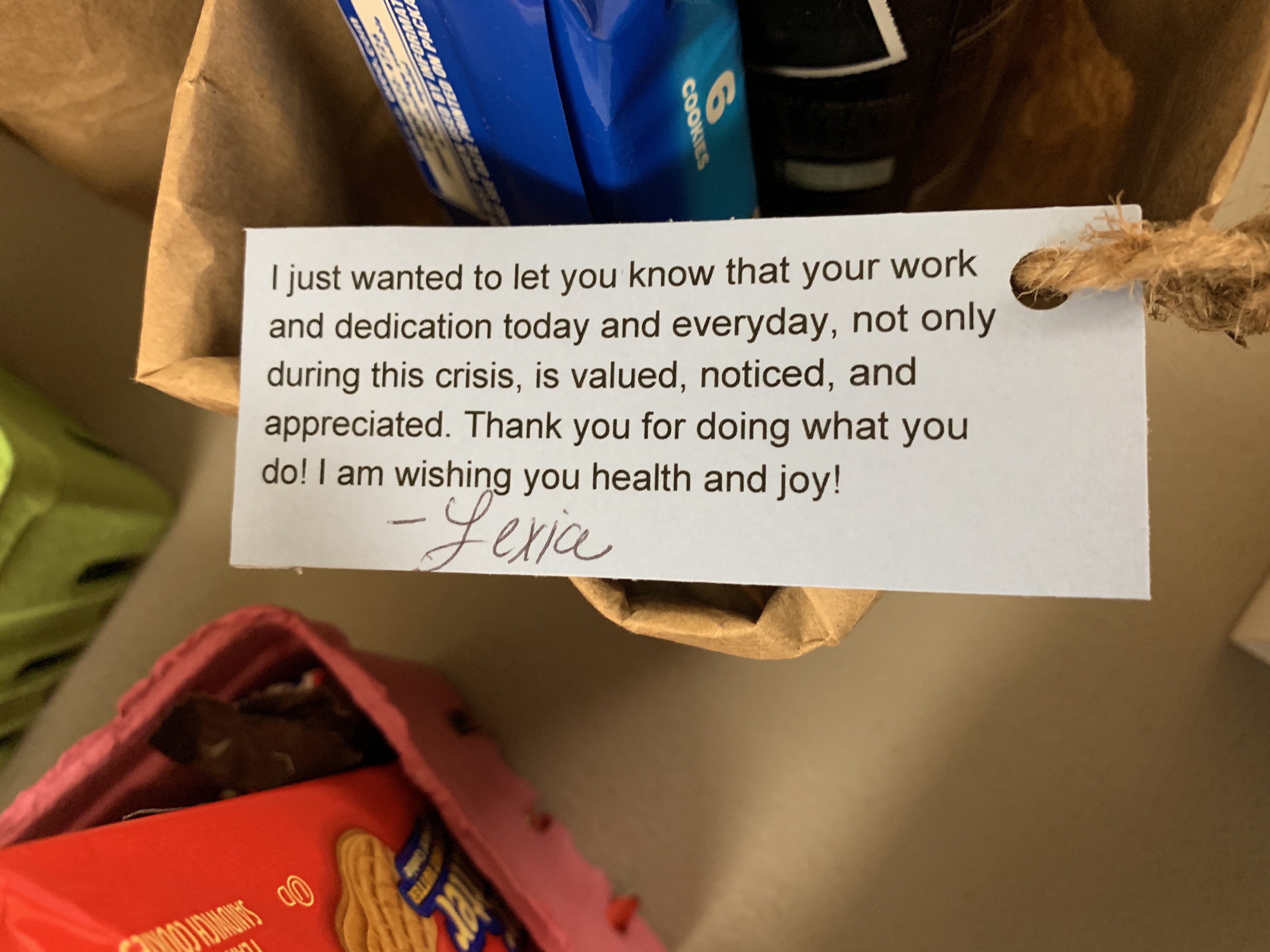 Lexie placed a note in every basket. snacks note