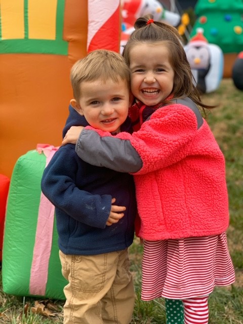 Ellis Frey (left) gets a hug from sister Cora. ellis6