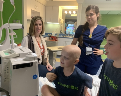 Stephanie Flynn with Liam, Aidan and nurse Sarah McGee Liam Flynn Hospital bed