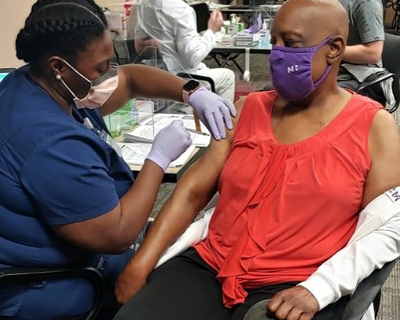 Dr. Ophelia Garmon-Brown: 'Having the vaccination does give me a sense of security that maybe – one day soon – I can be a little bit more free.' Dr. G-B vax photo crop JPG