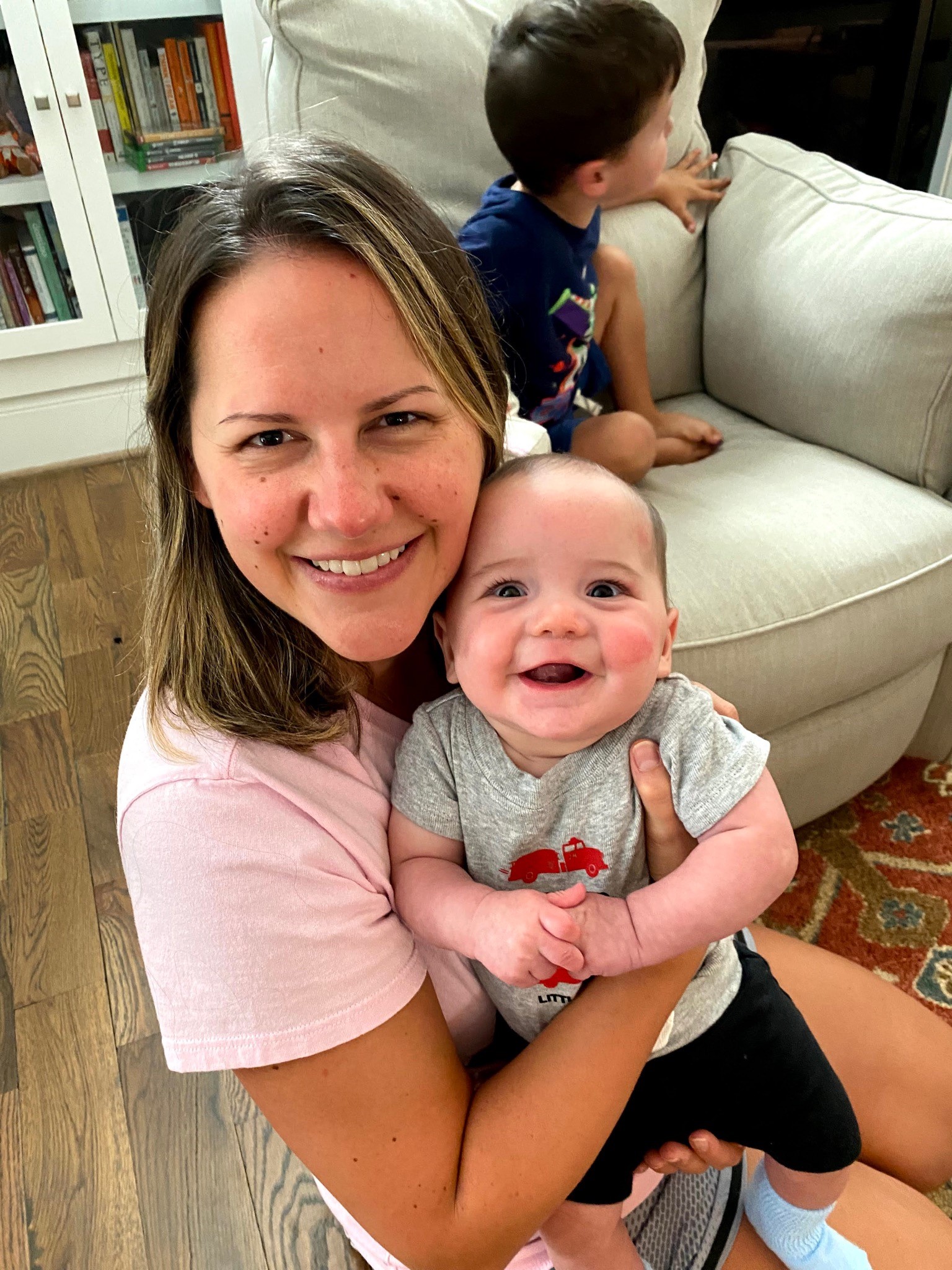Family nurse practitioner Carrie Bush smiles with her son, Henry.