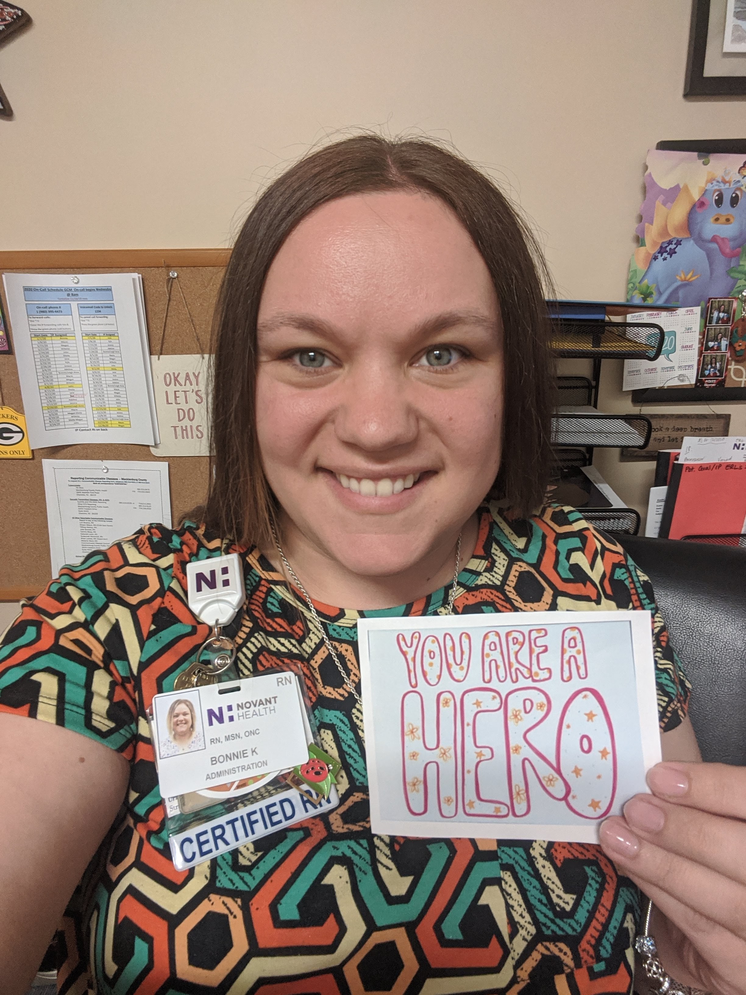 Nurse Bonnie Koski holds up a thank you card she received for being a health care hero during the COVID-19 pandemic. Bonnie Koski