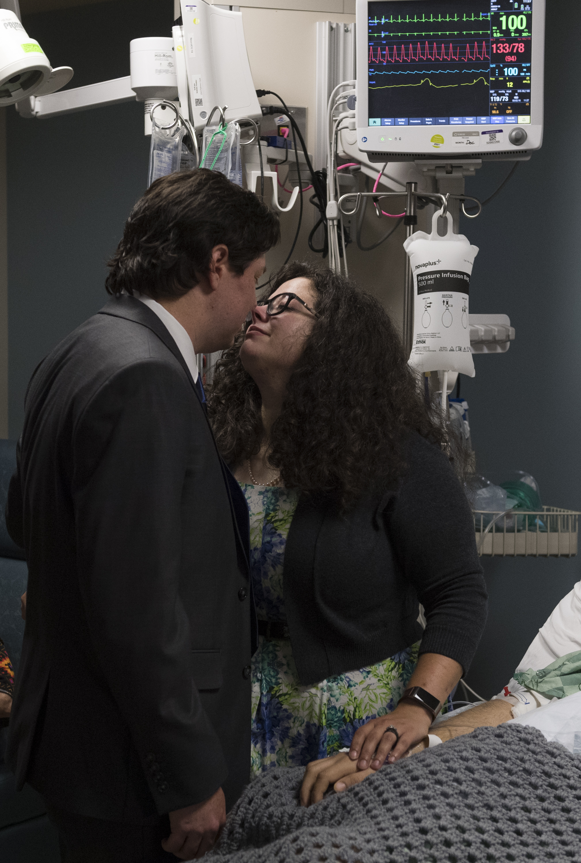 The newlyweds, Mr. and Mrs. Jeff McCormick, seal their marriage with a kiss at Novant Health Presbyterian Medical Center in Charlotte.