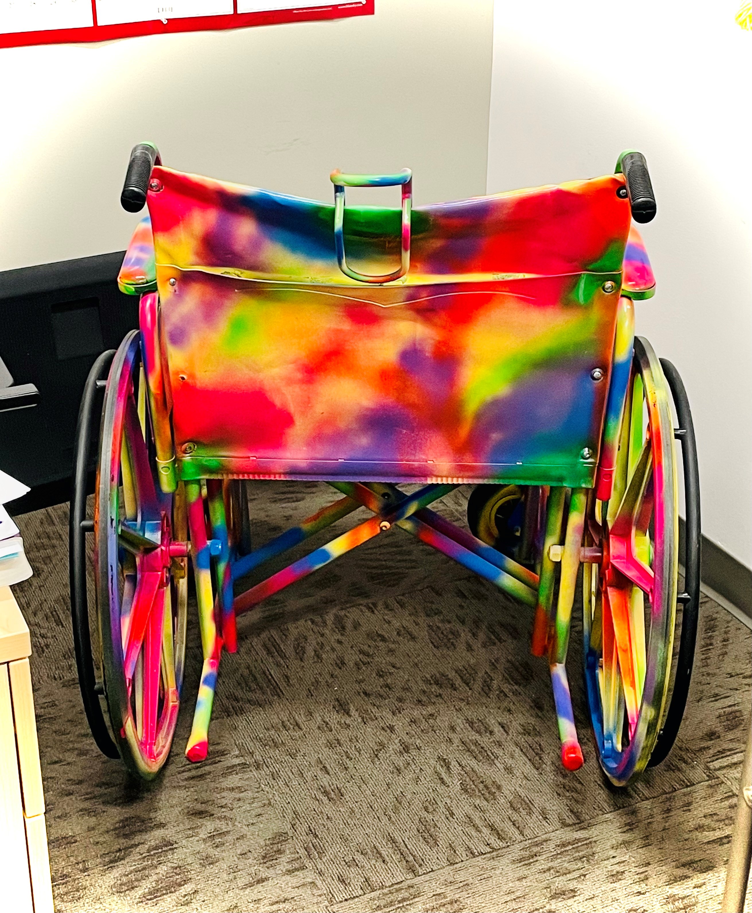 A tie-dye wheelchair that's meant to be inclusive of all LGBTQ%20 patients.