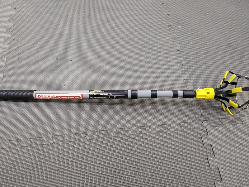 Extension tool for changing light bulbs