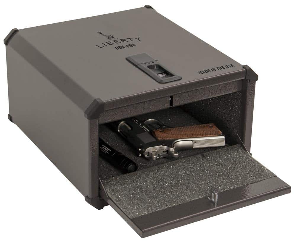 image of liberty safe with handgun and flashlight inside