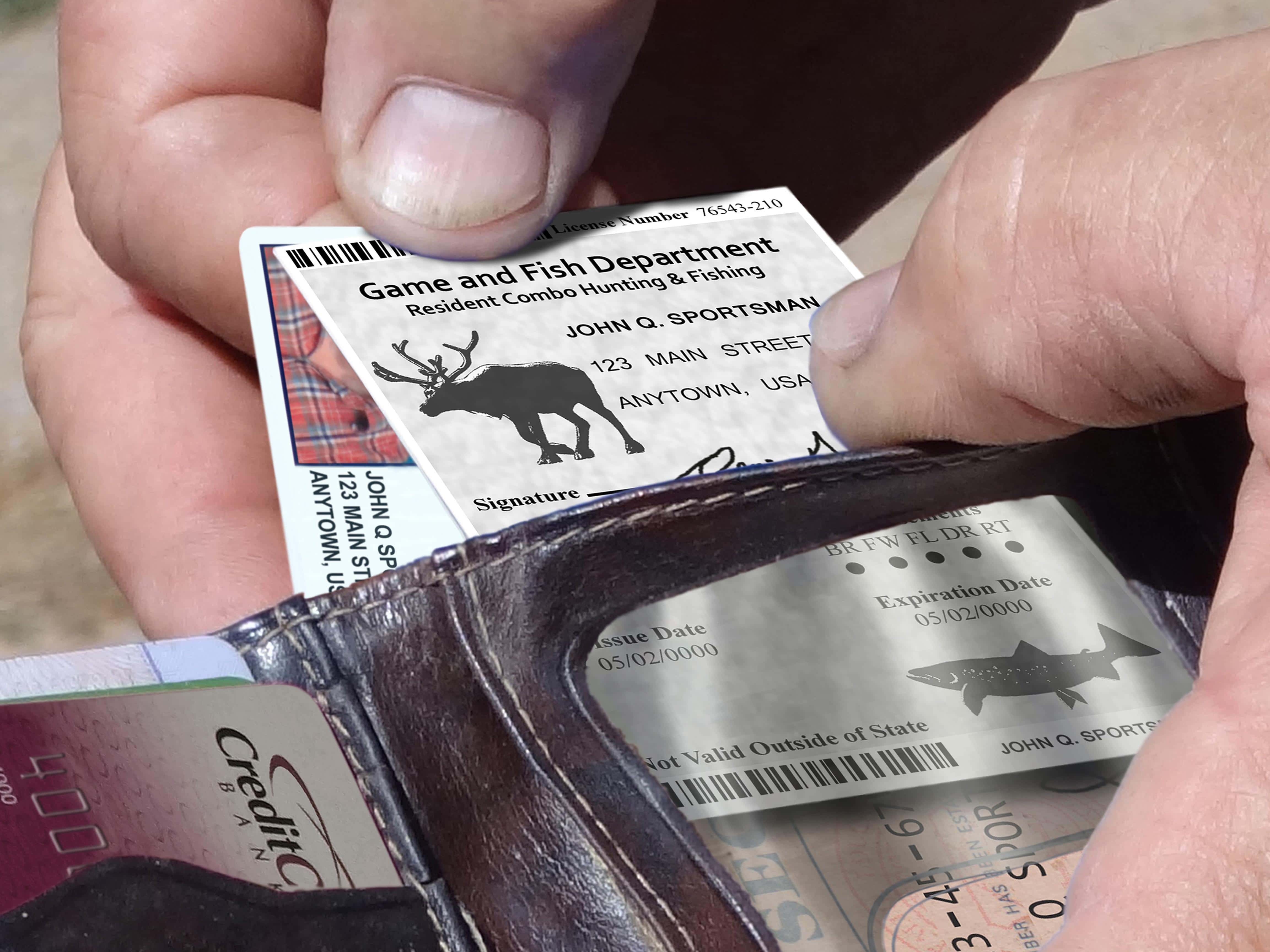 man removing fishing permit from wallet
