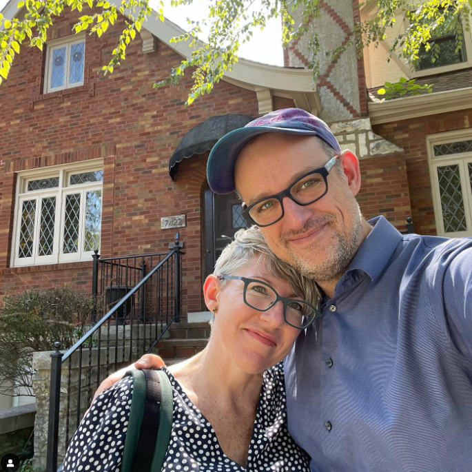 Phillip Maciak in front of new home. 