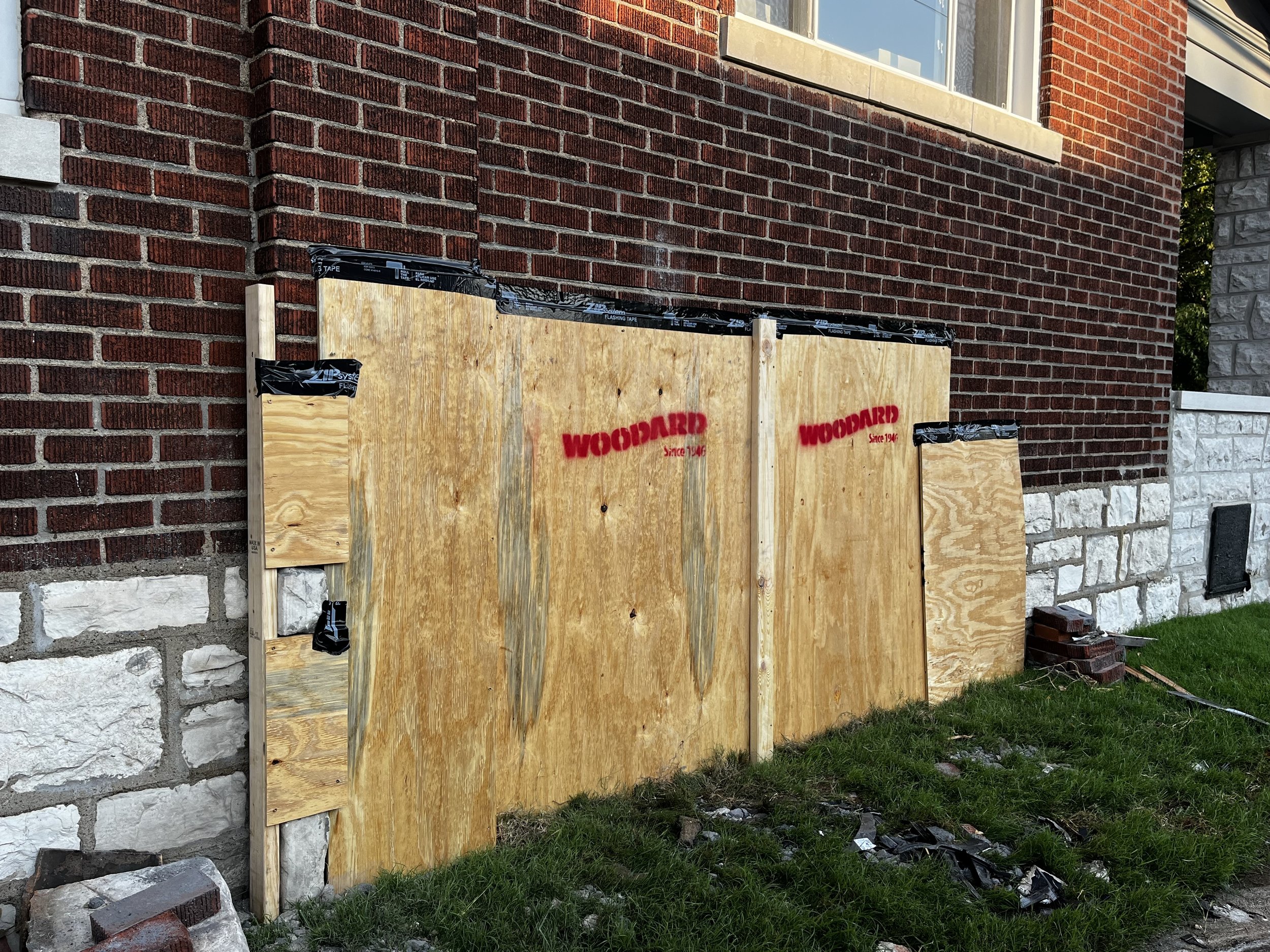 Hole in house boarded up