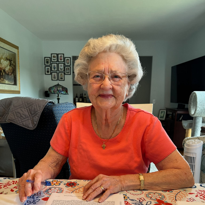 Client signing paperwork at home