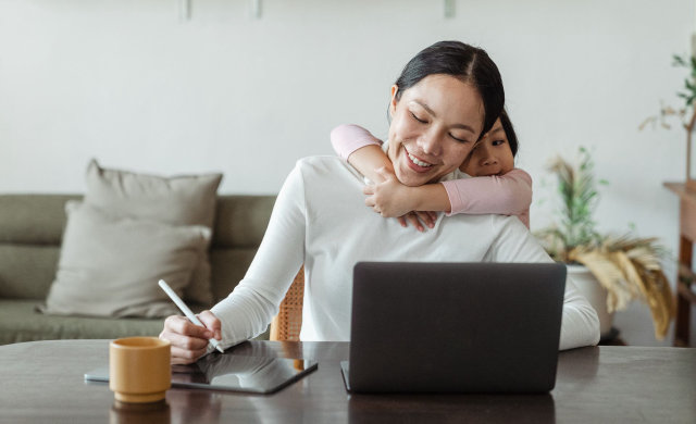 Woman looking up information on computer