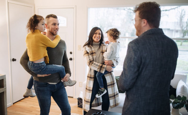 Couple touring house in St. Louis