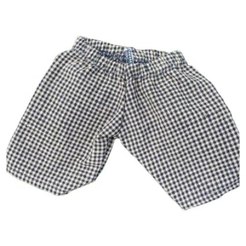 Pantalones de cuadros negro y caqui para muñecas Cabbage Patch 30-33 cm